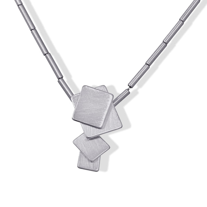 NECKLACE MADE WITH IRREGULAR WEDGE-SHAPE PIECES BRUSHED EFFECT