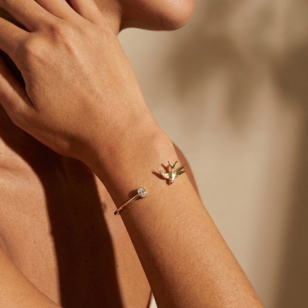 Armspange Messing vergoldet Kristall weiß