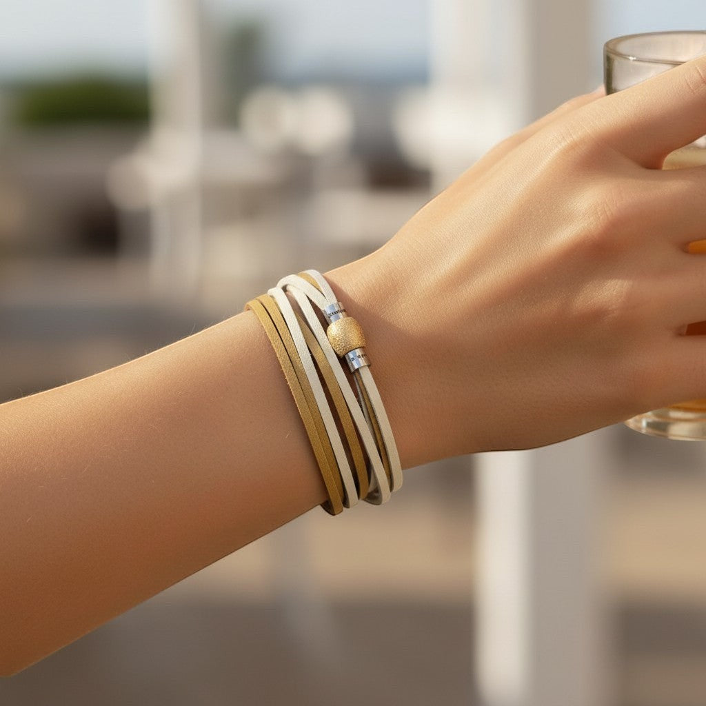 Peter Bijoux Modeschmuck Serena double wrap bracelet in cream and tan faux leather with gold glitter magnetic clasp.