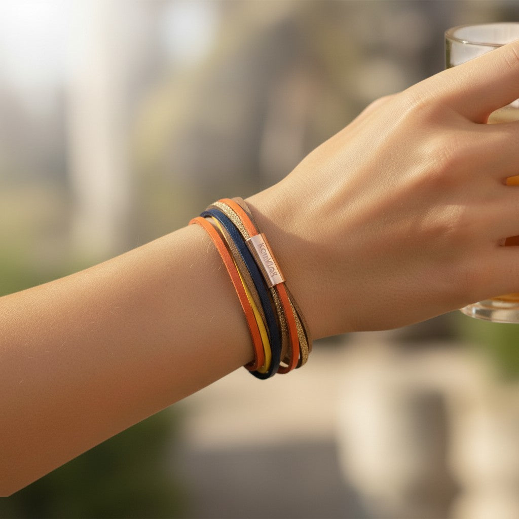 Peter Bijoux Modeschmuck Marin multi-strand faux leather wrap bracelet with magnetic clasp in natural tones.