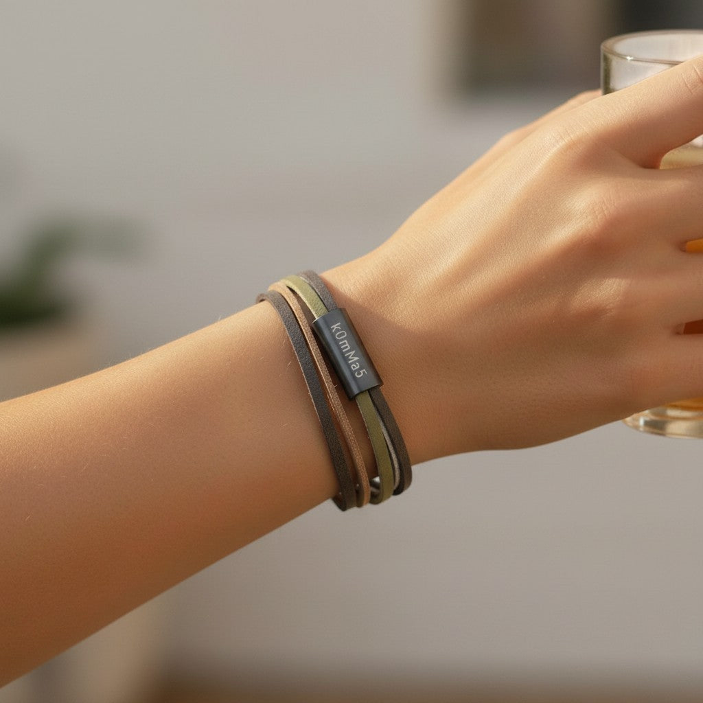 Peter Bijoux Modeschmuck multi-strand faux leather bracelet in natural tones with black stainless steel magnetic clasp.